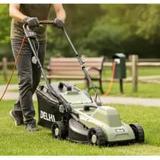 Cortadora De Pasto Eléctrica 1300w 3 Niveles Delhi Con Bolsa Color Verde